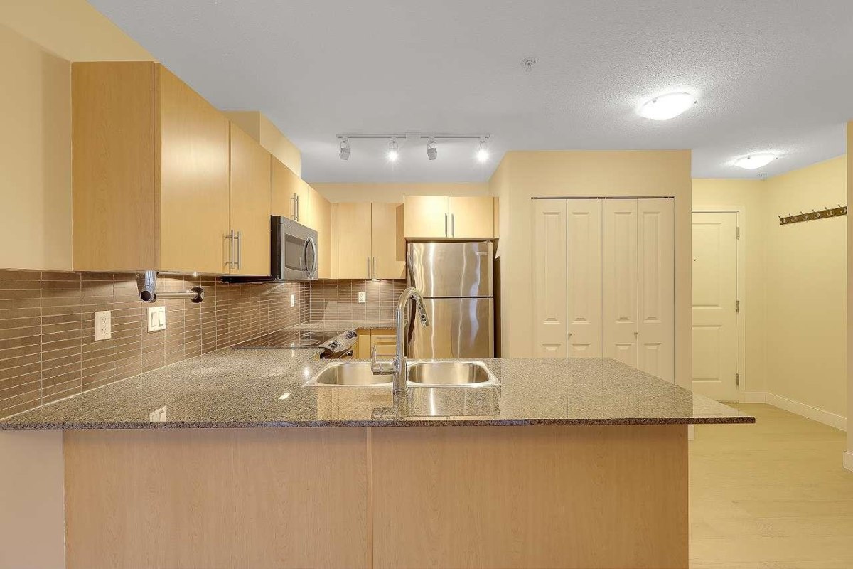 Living Room Photo of A316 8929 202 Street, Langley, BC