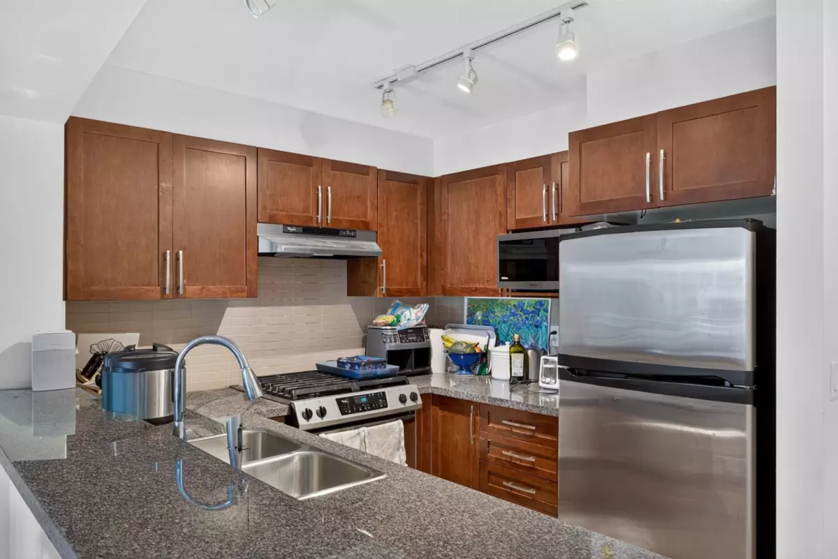 Exterior Rear Photo of 311 5725 Agronomy Road, Vancouver, BC