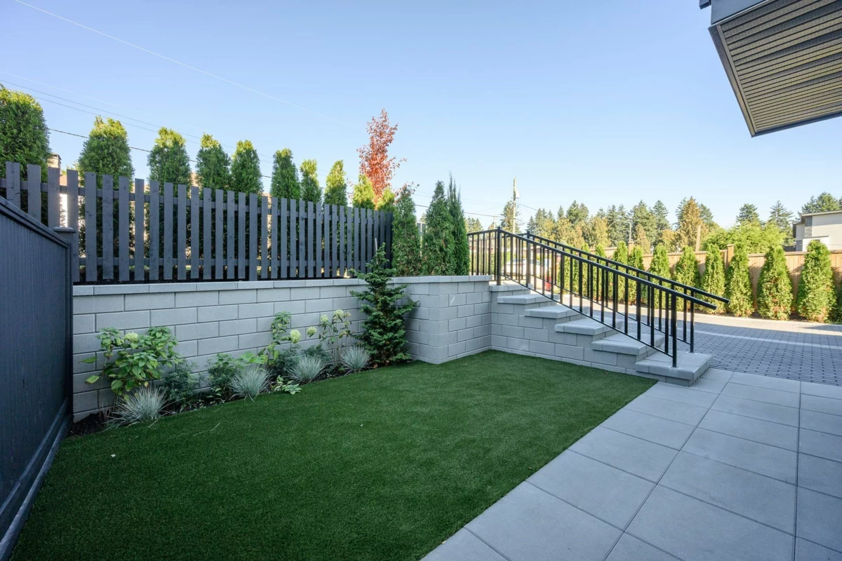 Exterior Rear Photo of 102 1132 Madore Avenue, Coquitlam, BC