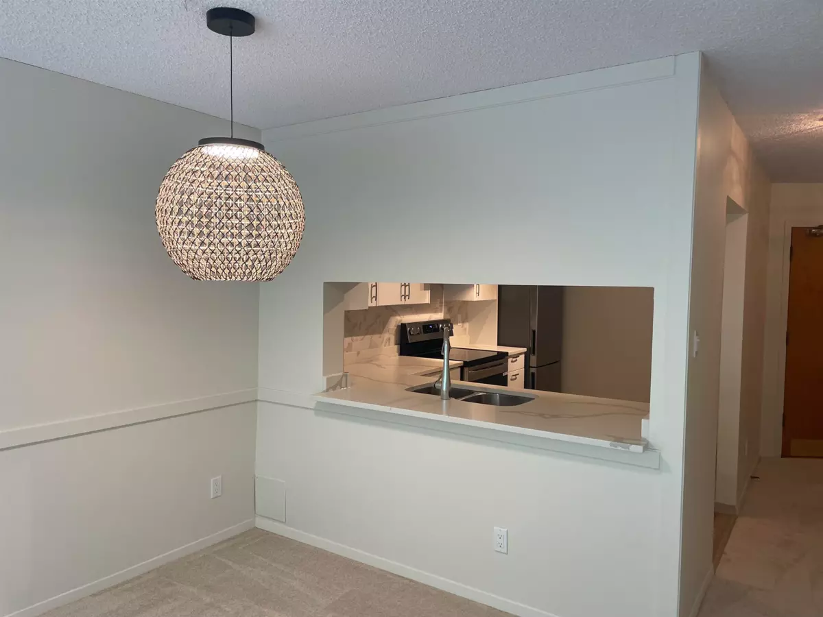Family Room Photo of 305 6070 Mcmurray Avenue, Burnaby, BC