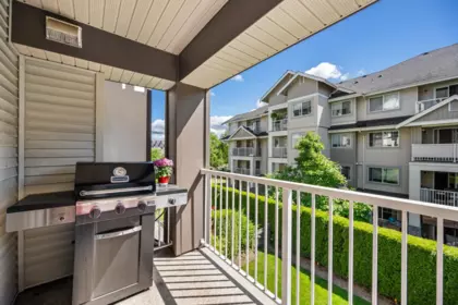 Laundry Room Photo of 206 19340 65 Avenue, Surrey, BC