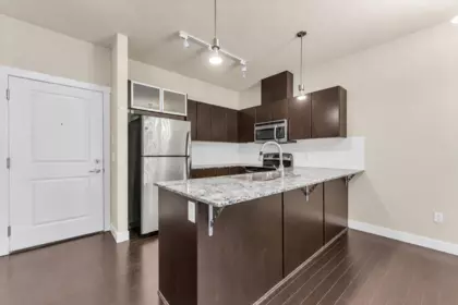 Dining Area Photo of 409 9655 King George Boulevard, Surrey, BC