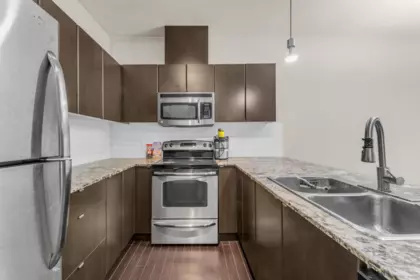 Family Room Photo of 409 9655 King George Boulevard, Surrey, BC