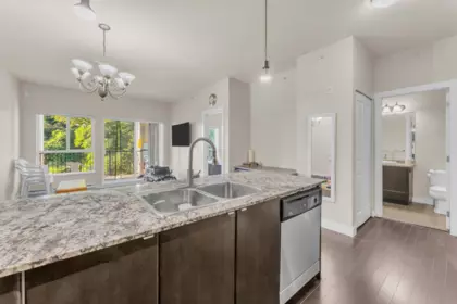 Kitchen Island Photo of 409 9655 King George Boulevard, Surrey, BC