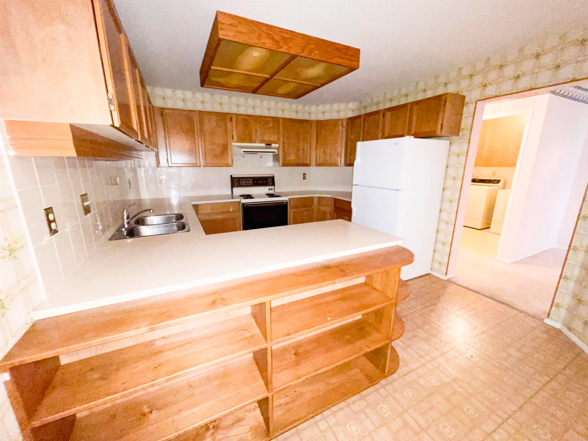 Living Room Photo of 102 13894 102 Avenue, Surrey, BC