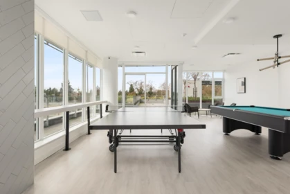 Basement Recreation Room Photo of 303 9675 King George Boulevard, Surrey, BC