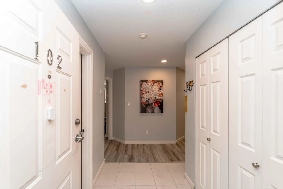 Living Room Photo of 102 33675 Marshall Road, Abbotsford, BC