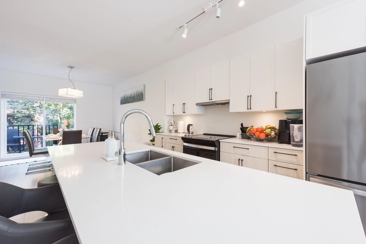 Living Room Photo of 406 2267 Mckenzie Road, Abbotsford, BC