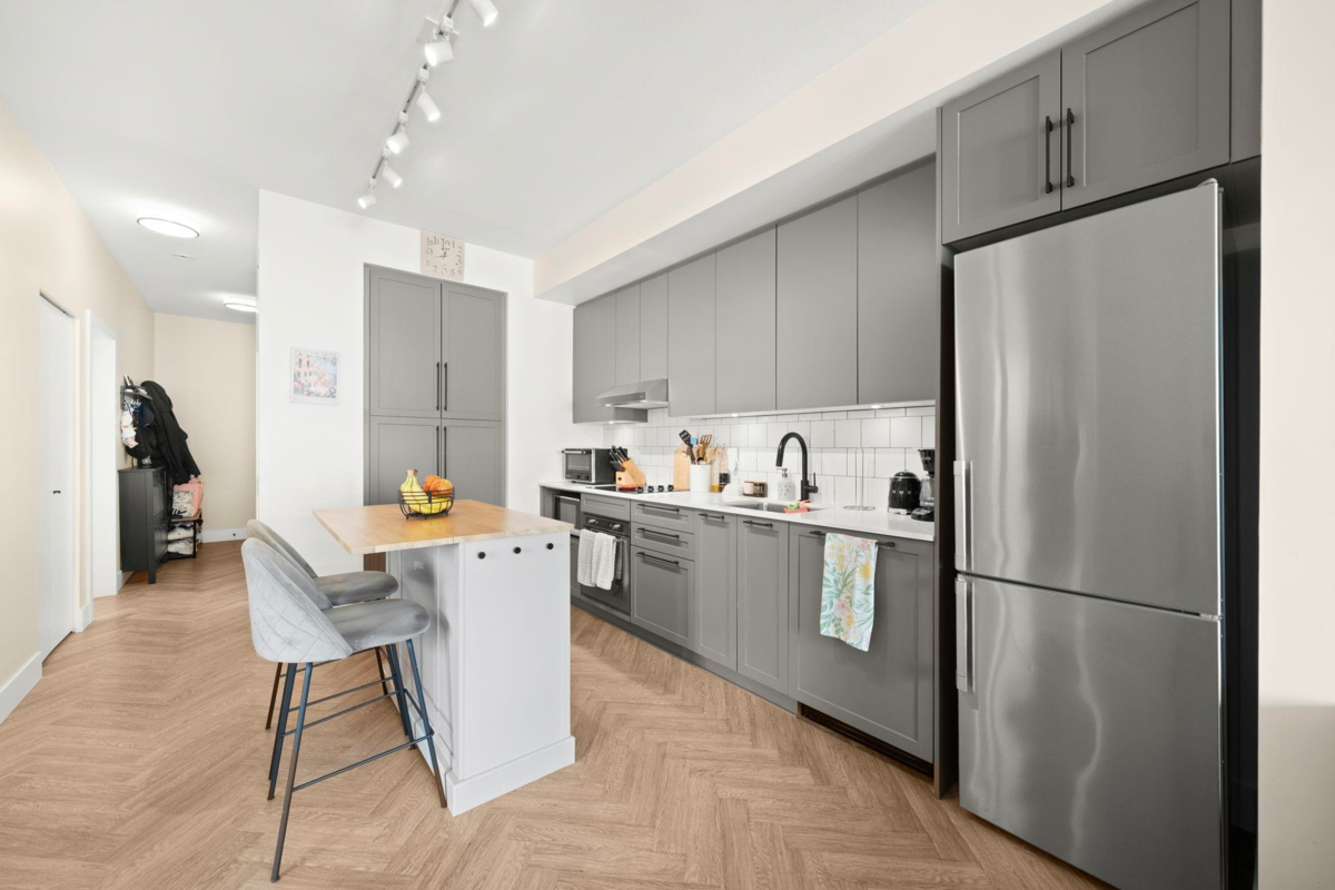 Living Room Photo of 514 9228 Slopes Mews, Burnaby, BC