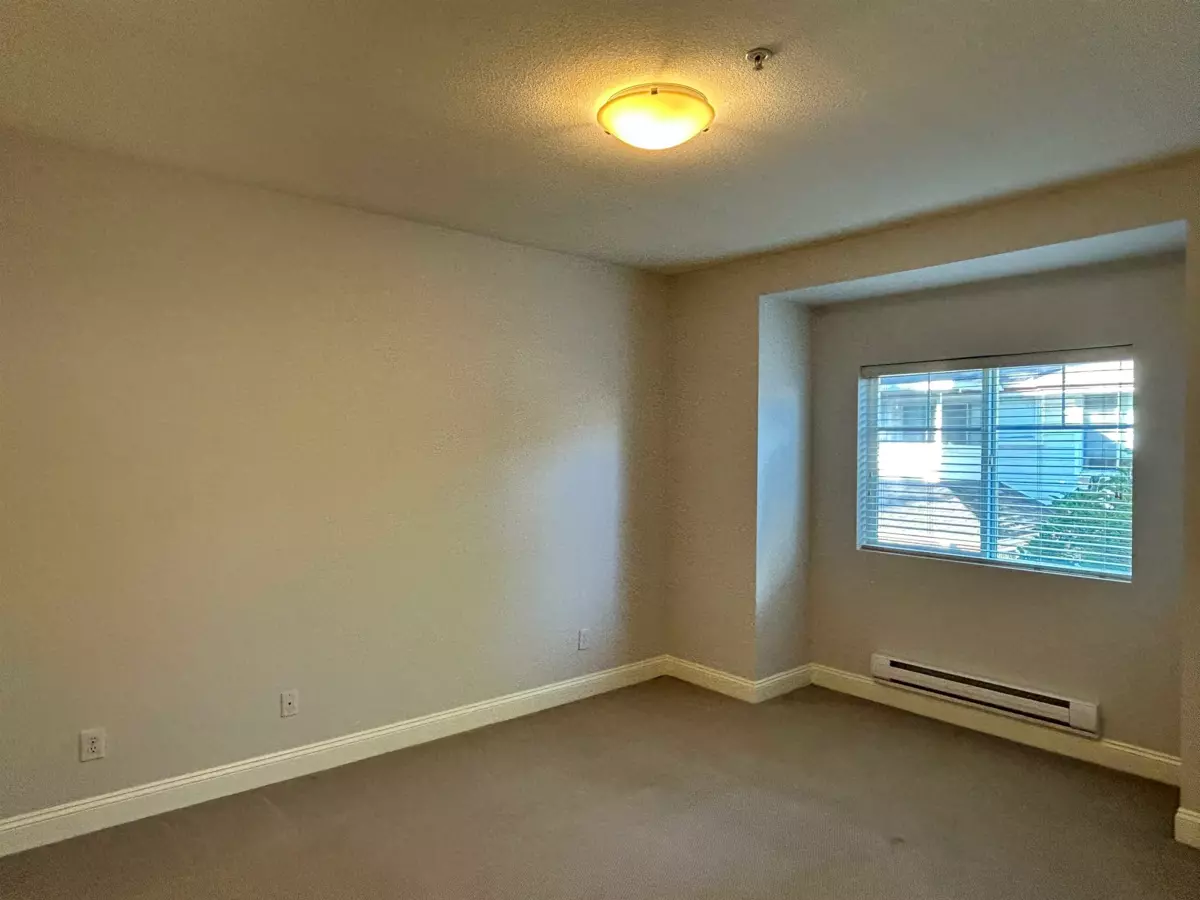 Primary Bedroom Photo of 215 22150 Dewdney Trunk Road, Maple Ridge, BC