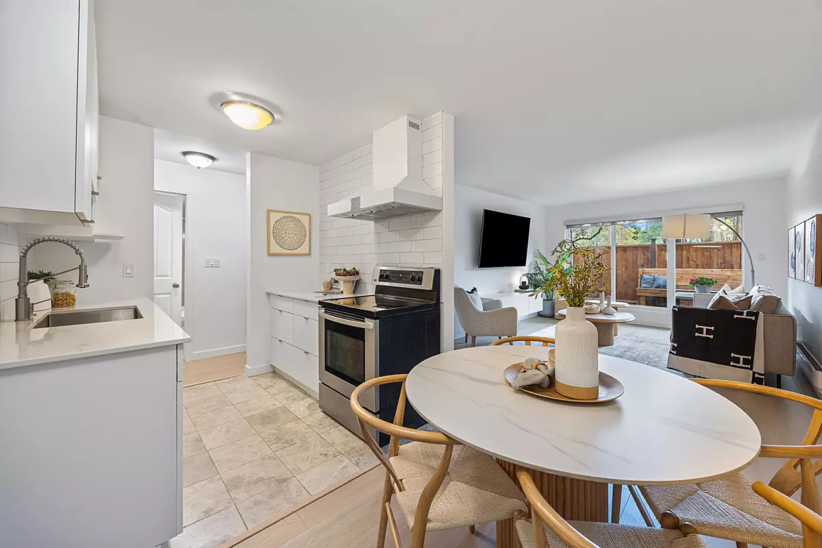 Living Room Photo of 105 1440 E Broadway, Vancouver, BC