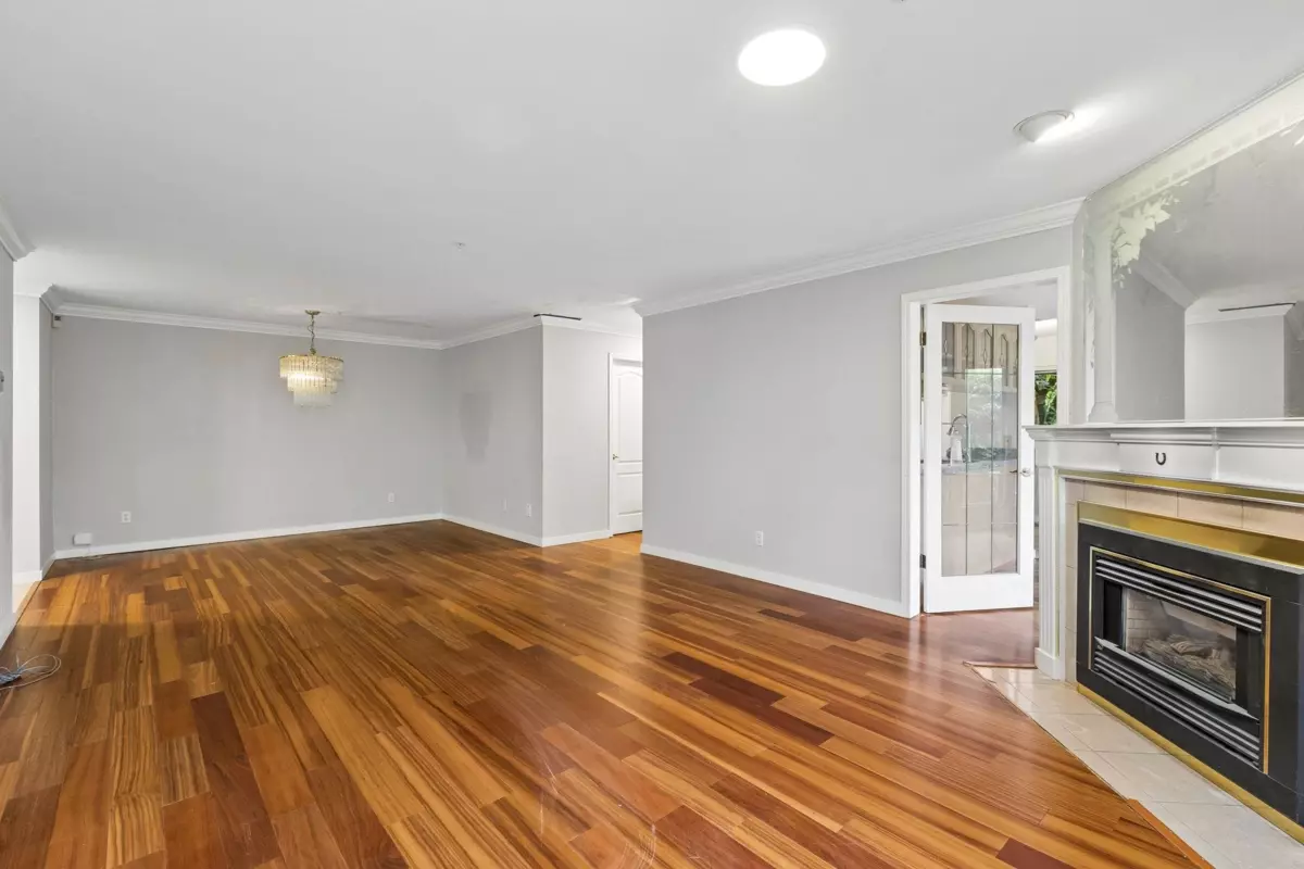 Living Room Photo of 103 7580 Columbia Street, Vancouver, BC