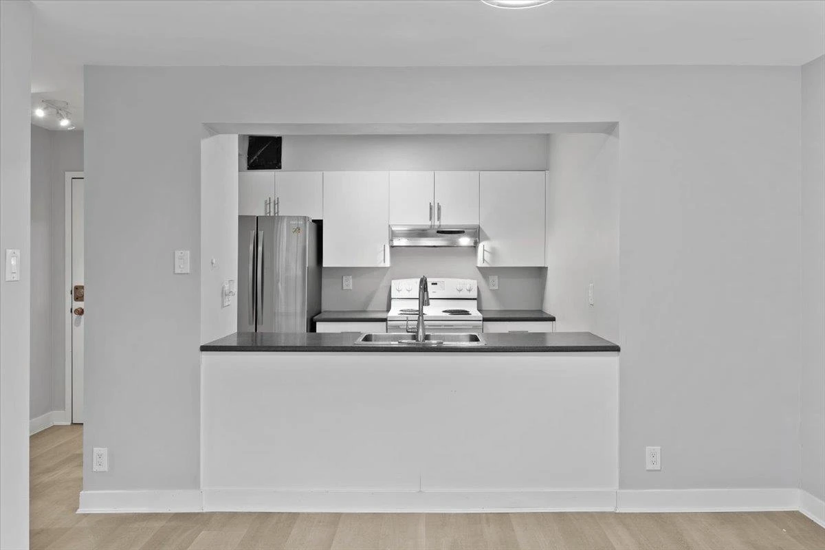 Living Room Photo of 403 9521 Cardston Court, Burnaby, BC