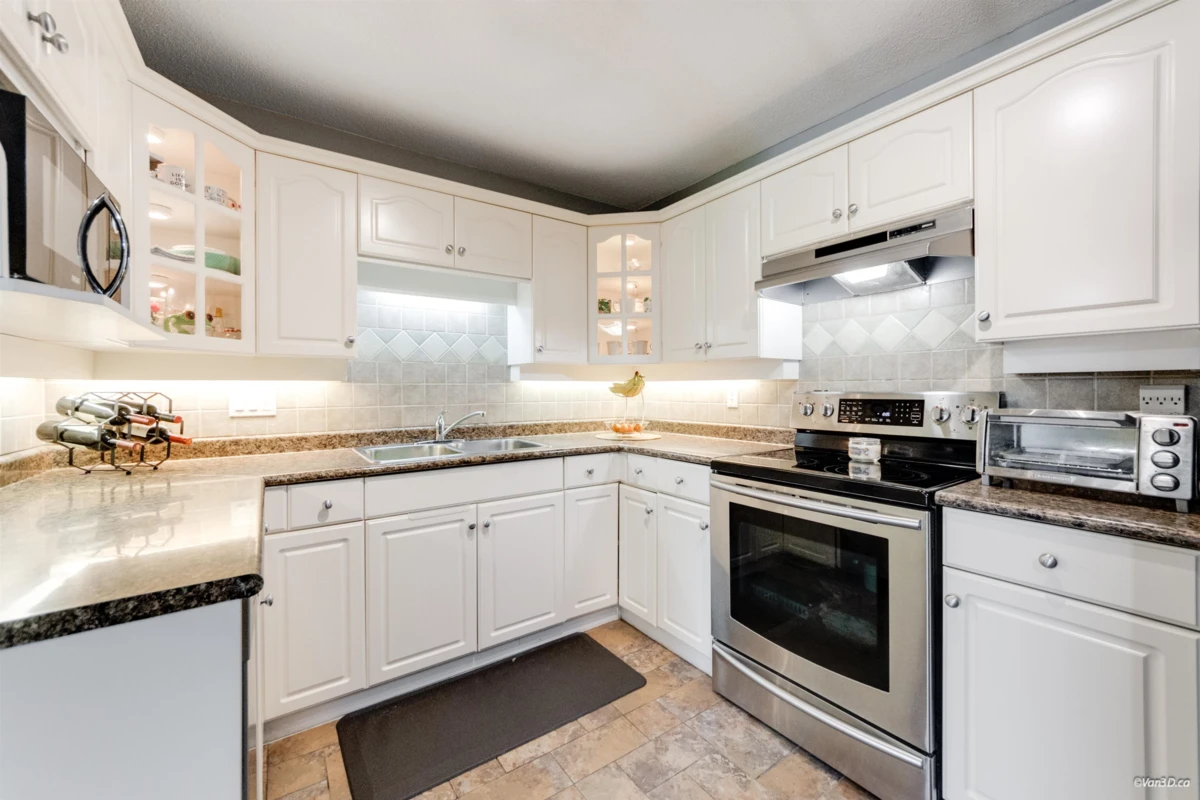 Family Room Photo of 203 17740 58a Avenue, Surrey, BC