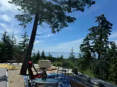 Basement Recreation Room Photo of 6016 Leaning Tree Road, Halfmoon Bay, BC