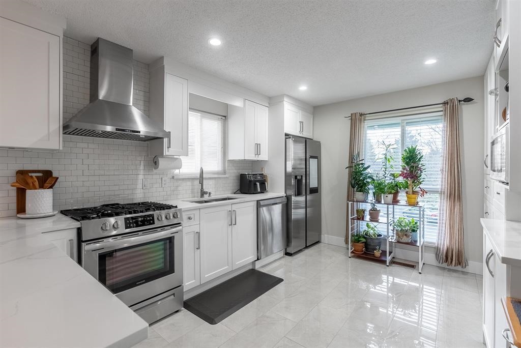 Exterior Rear Photo of 12859 68a Avenue, Surrey, BC