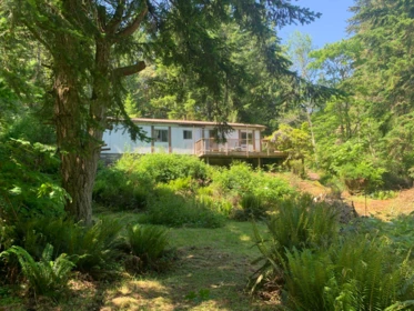 Primary Bedroom Photo of 23180 Porlier Pass Road, Galiano Island, BC