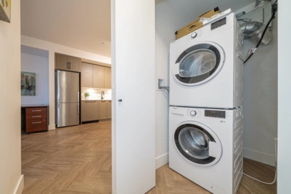 Laundry Room Photo of 211 9228 Slopes Mews, Burnaby, BC
