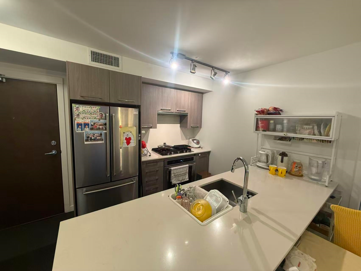 Family Room Photo of 605 7708 Alderbridge Way, Richmond, BC