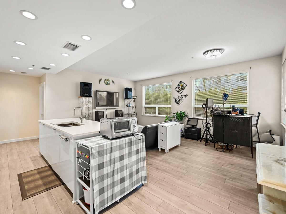 Living Room Photo of 102 9213 Odlin Road, Richmond, BC