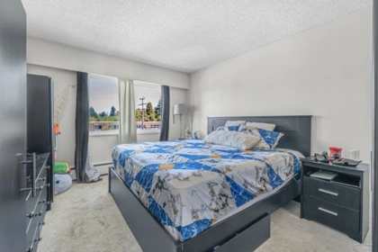 Bedroom 2 Photo of 304 13530 Hilton Road, Surrey, BC
