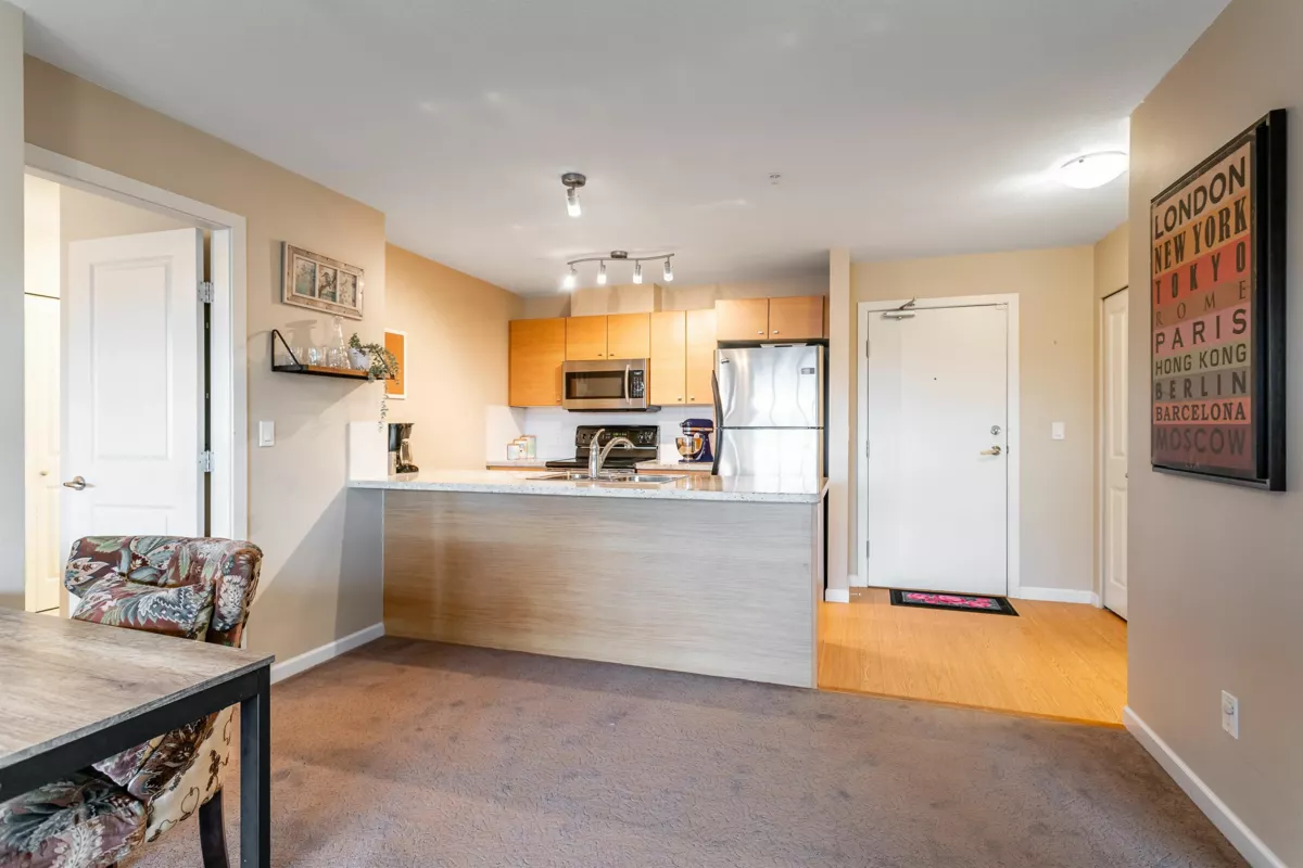 Family Room Photo of 312 18755 68 Avenue, Surrey, BC