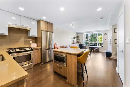 Kitchen Island Photo of 104 9350 University High Street, Burnaby, BC