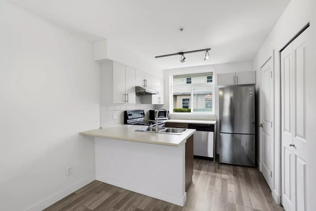 Living Room Photo of 206 5632 Kings Road, Vancouver, BC