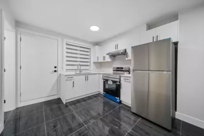 Laundry Room Photo of 101 16631 18 Avenue, Surrey, BC