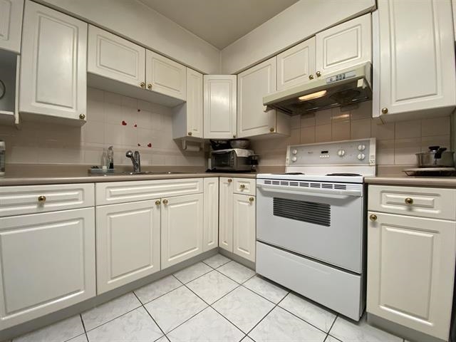 Kitchen Island Photo of 6828 Inverness Street, Vancouver, BC