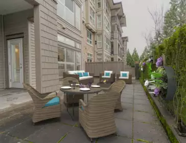 Front exterior of 105 1330 Genest Way, Coquitlam, BC