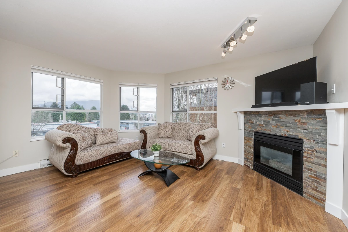 Living Room Photo of 406 2285 Pitt River Road, Port Coquitlam, BC