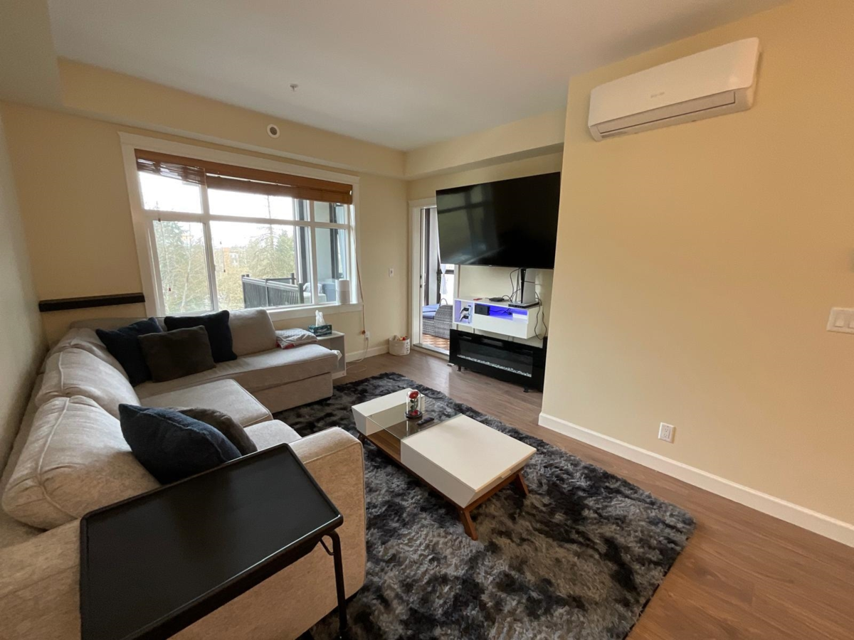Living Room Photo of 401 8558 202b Street, Langley, BC
