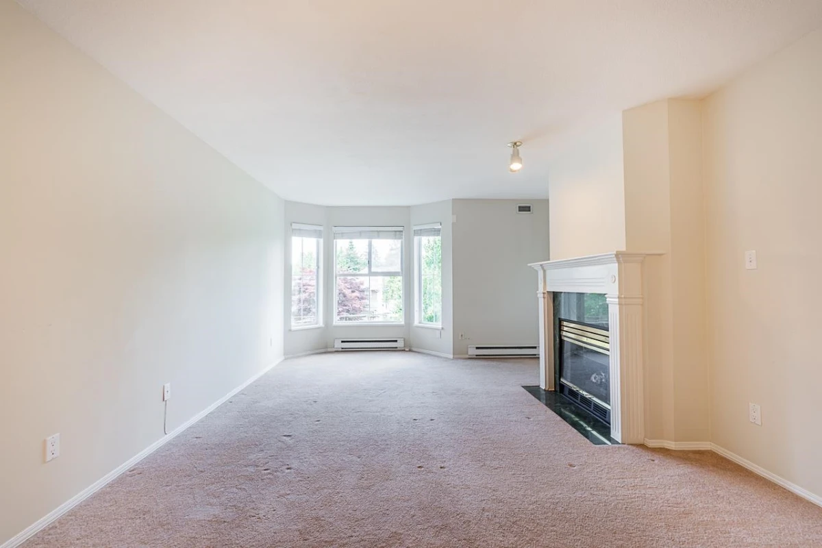 Living Room Photo of 314 15110 108 Avenue, Surrey, BC