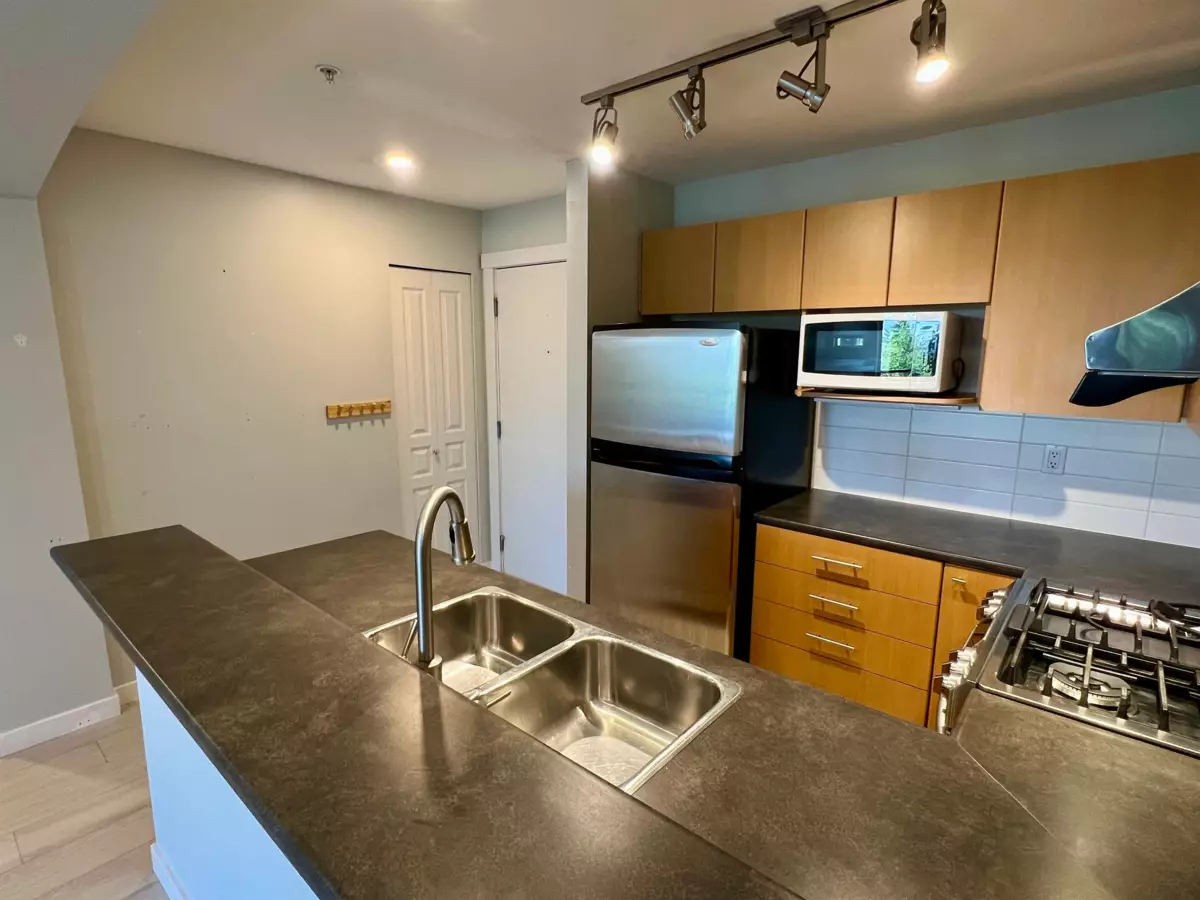 Family Room Photo of 311 9329 University Crescent, Burnaby, BC