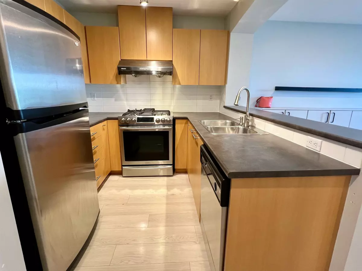 Living Room Photo of 311 9329 University Crescent, Burnaby, BC