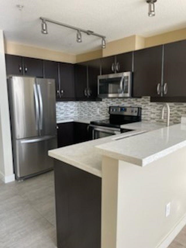 Dining Area Photo of 427 10838 City Parkway, Surrey, BC