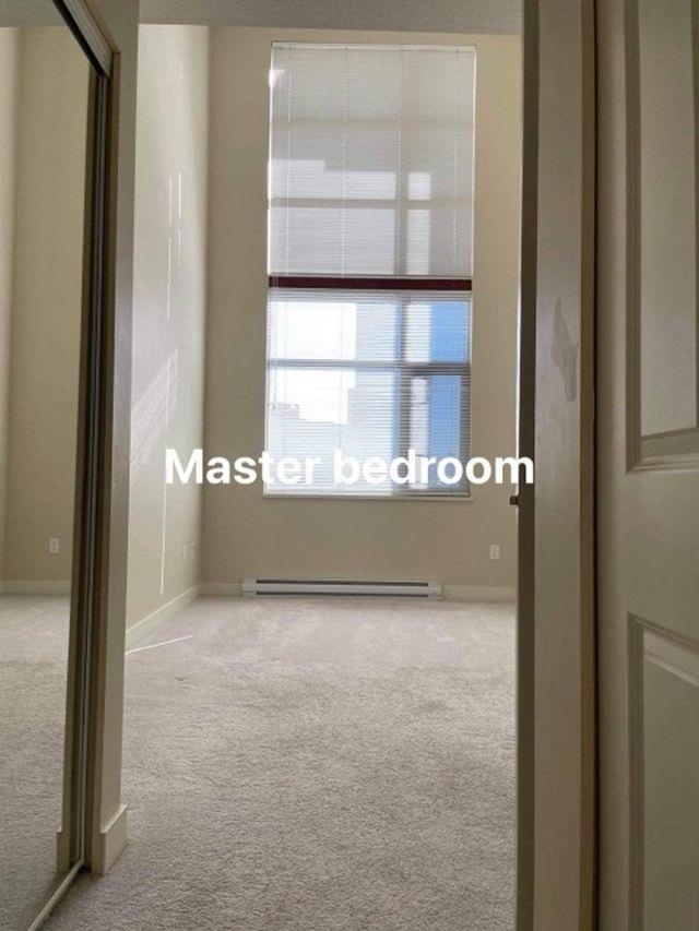 Primary Bedroom Photo of 427 10838 City Parkway, Surrey, BC