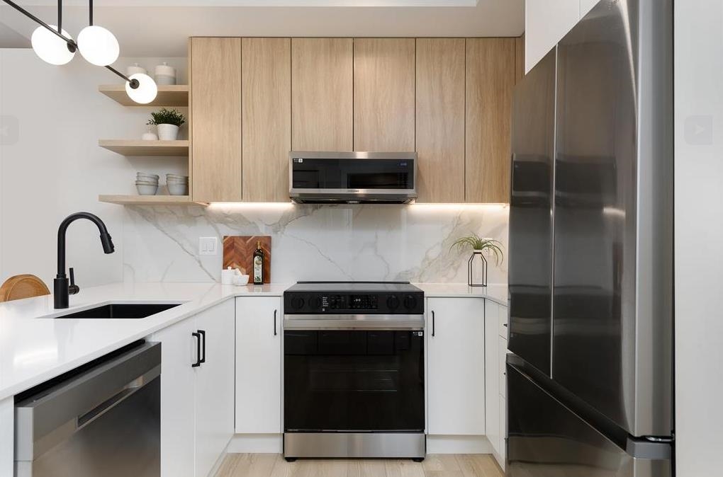 Living Room Photo of 208 33522 Cottage Lane, Abbotsford, BC