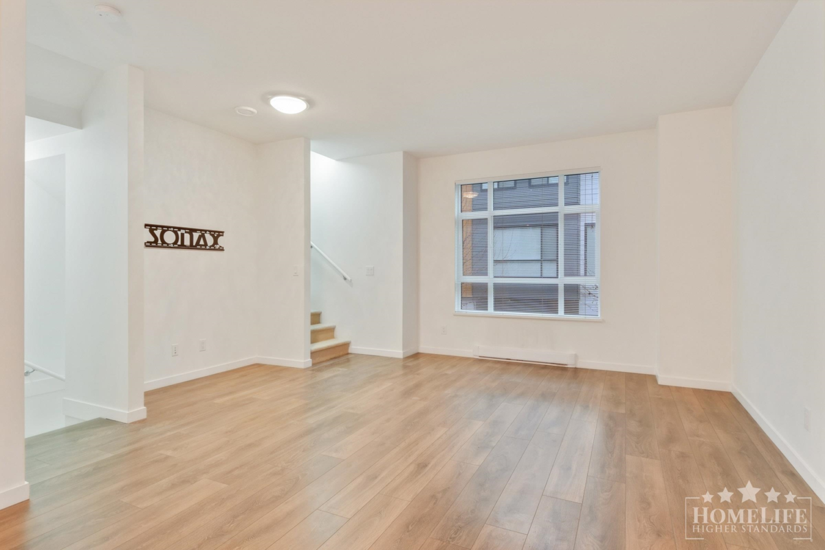 Living Room Photo of 503 16433 Watson Drive, Surrey, BC