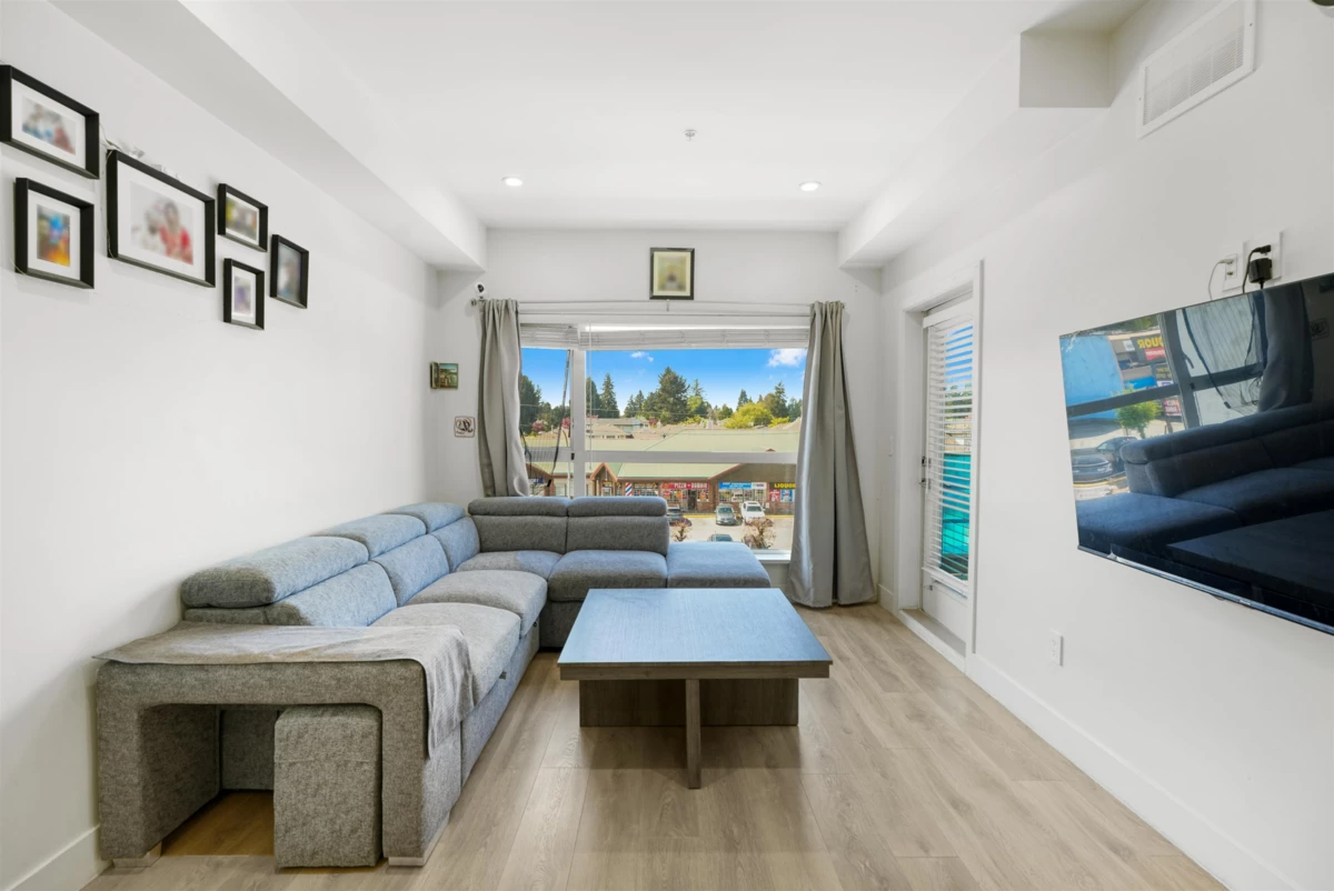 Living Room Photo of 312 8496 120 Street, Surrey, BC