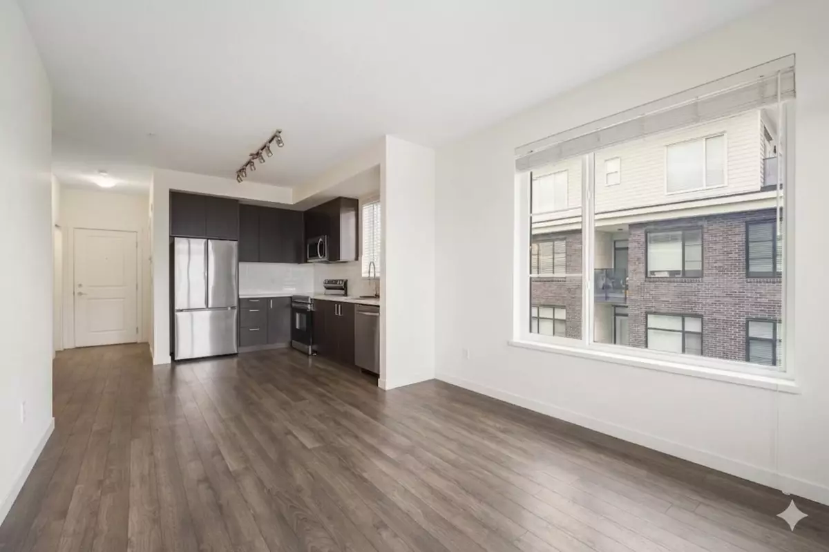 Living Room Photo of 501 15858 Fraser Highway, Surrey, BC