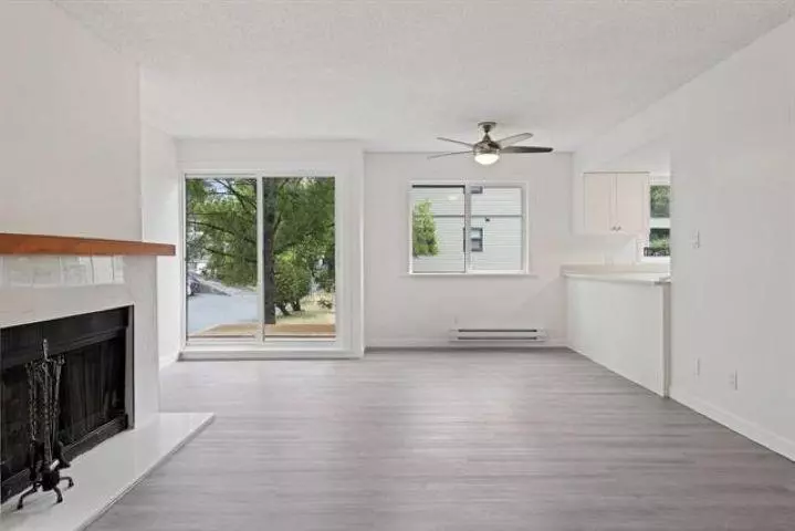 Living Room Photo of 204 7120 133 Street, Surrey, BC