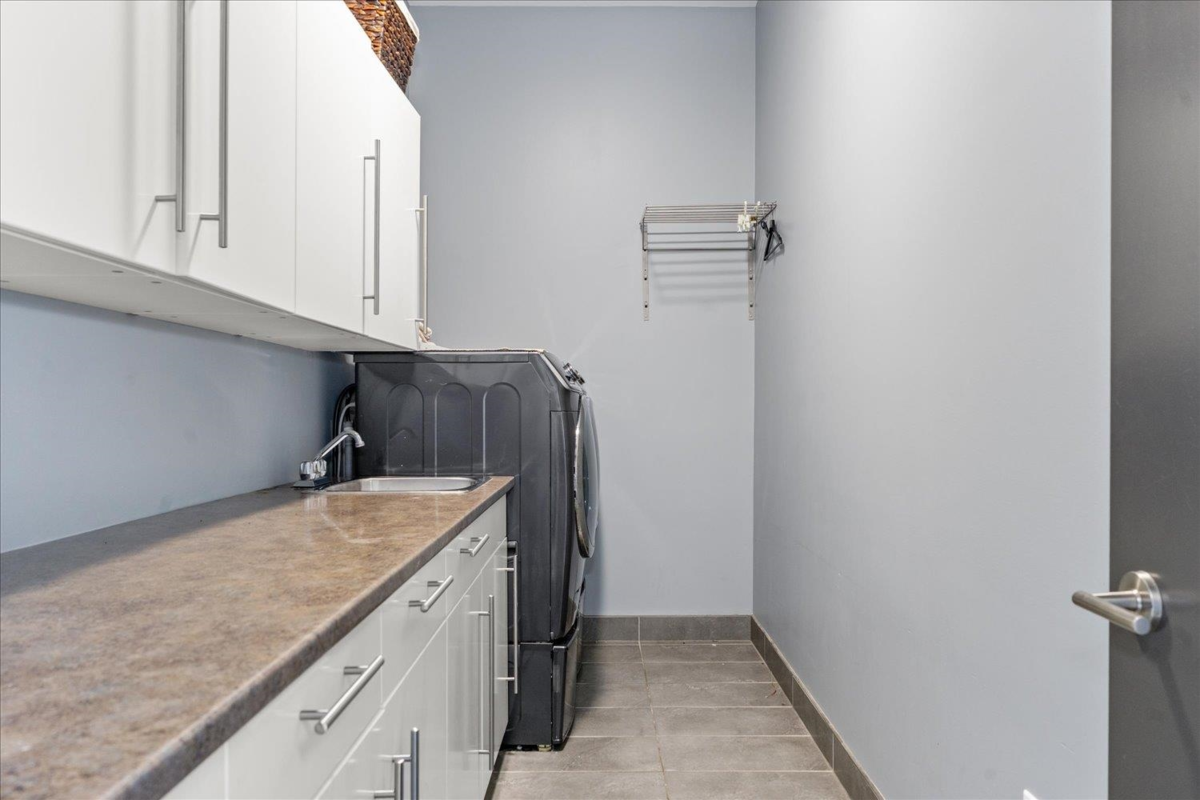 Laundry Room Photo of 216 51075 Falls Court, Chilliwack, BC