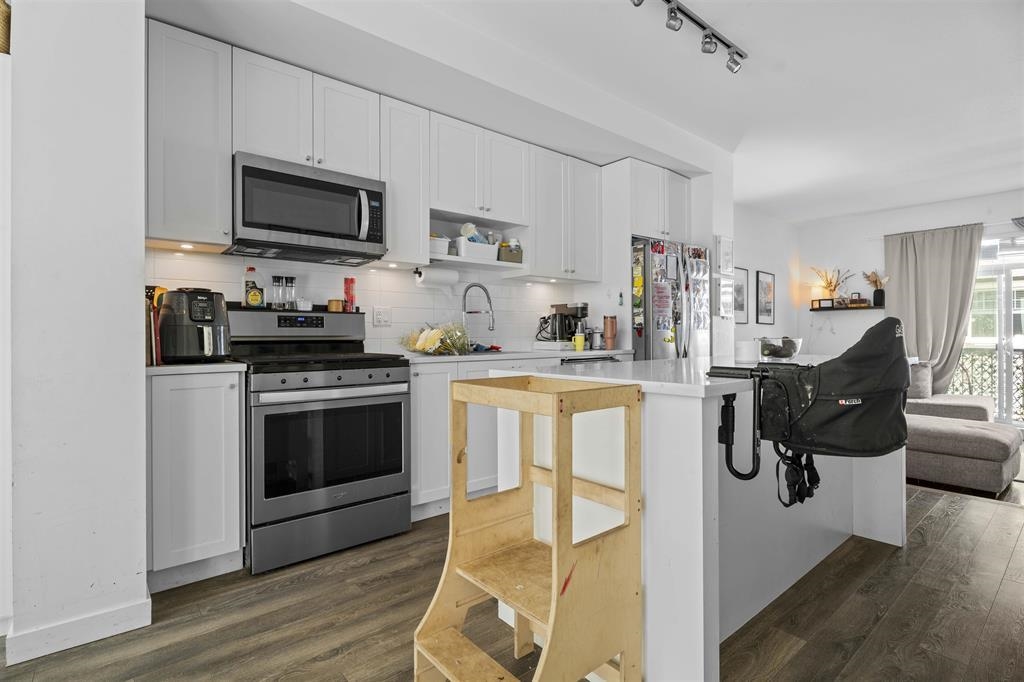 Family Room Photo of 8 16678 25 Avenue, Surrey, BC