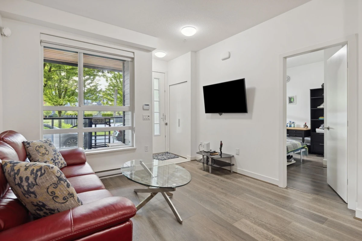 Living Room Photo of 102 6033 Gray Avenue, Vancouver, BC