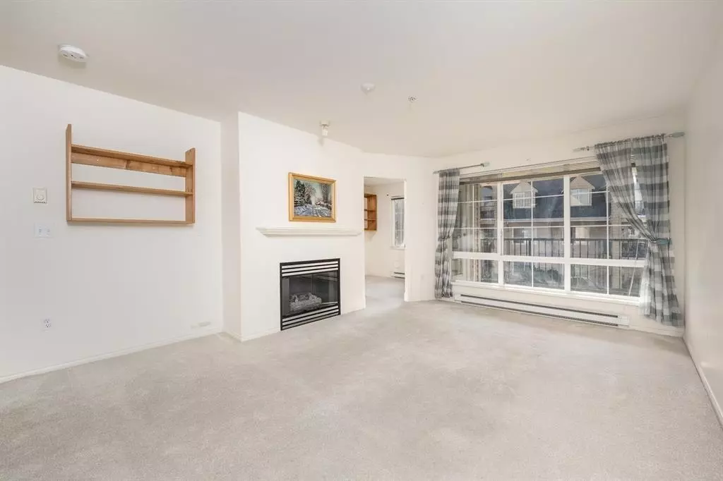 Living Room Photo of 311 1363 56 Street, Delta, BC