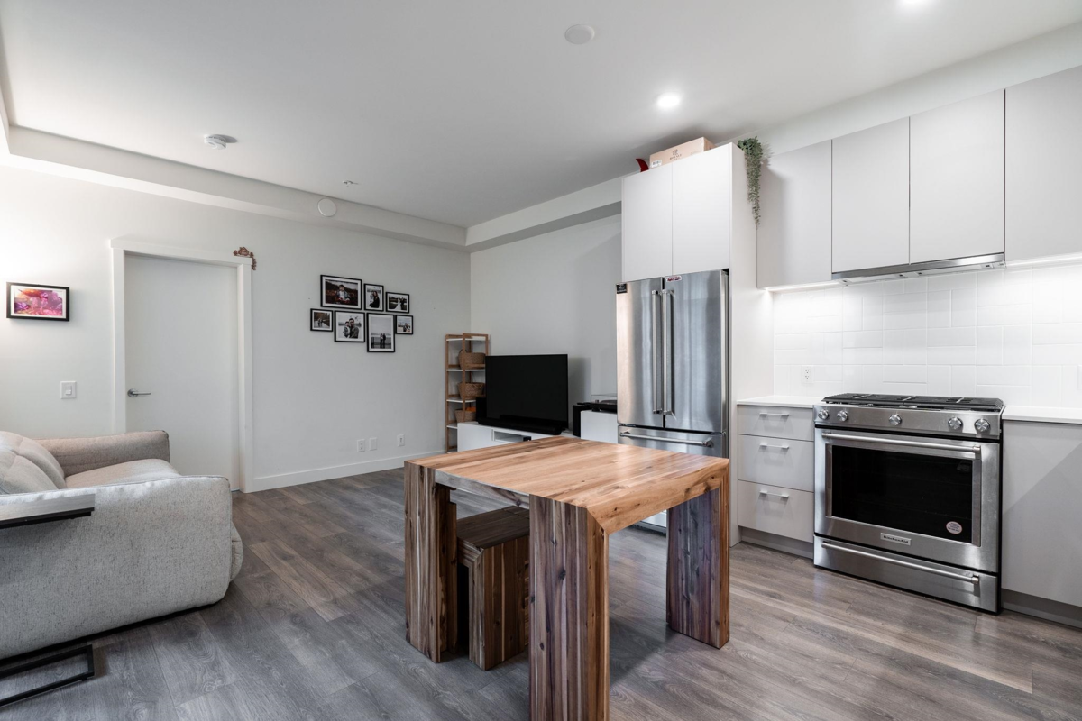 Living Room Photo of 101 741 Anskar Court, Coquitlam, BC
