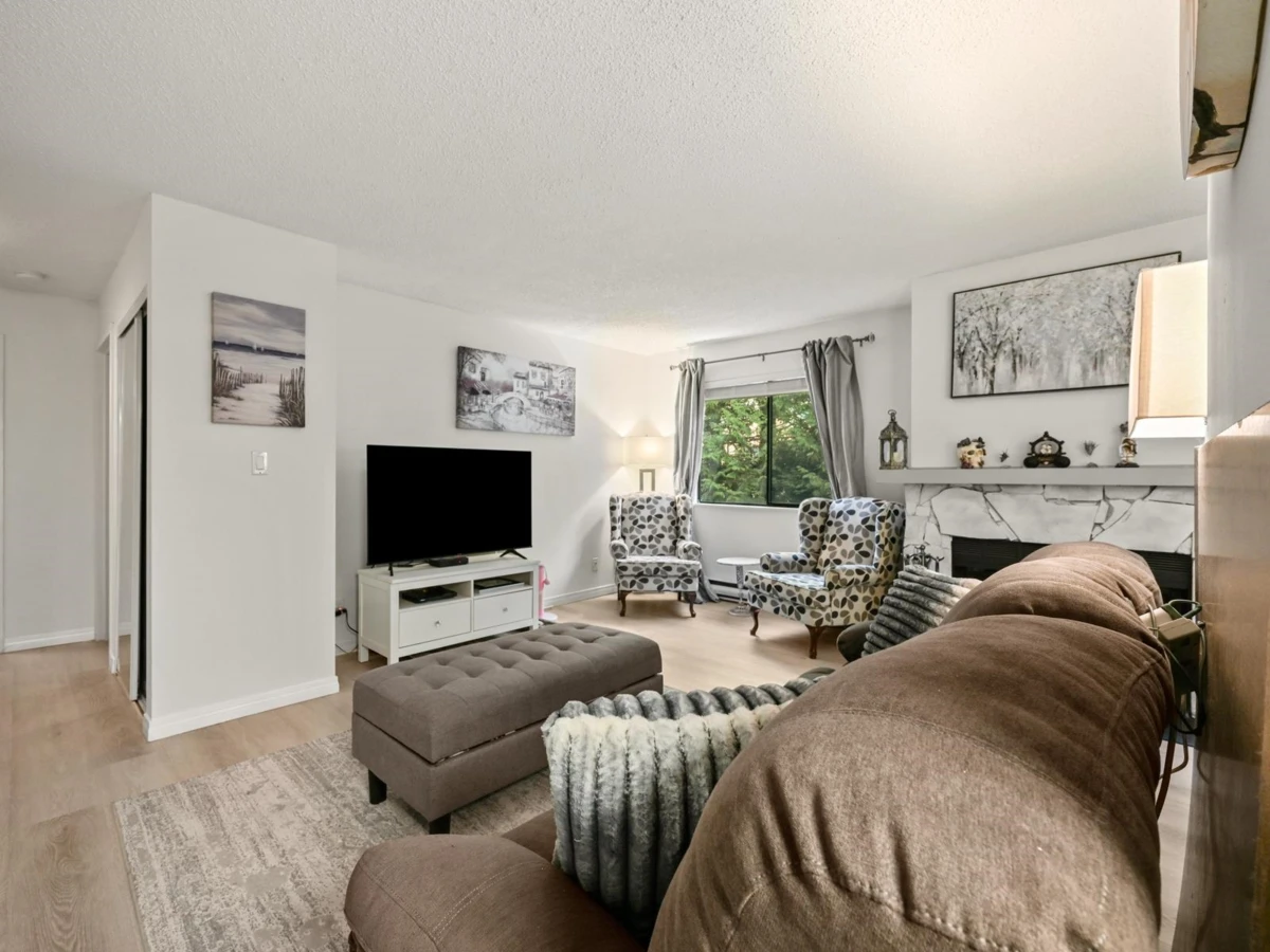 Living Room Photo of 202 7095 133b Street, Surrey, BC