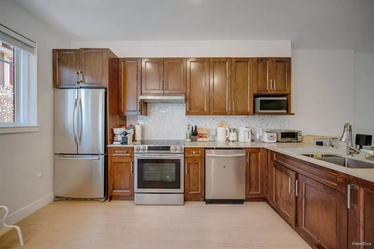 Family Room Photo of 2 9780 General Currie Road, Richmond, BC